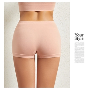 Detail of skin-pink seamless safety shorts showing high-elasticity fabric and fit