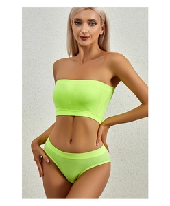 Neon green ribbed knit bralette and panty set showing detailed fabric texture