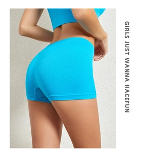 Detail view of bright blue seamless safety shorts showing high elastic shaping and lift