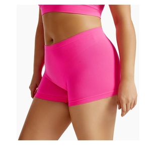 Detail view of seamless neon pink safety shorts with high elasticity and fine texture