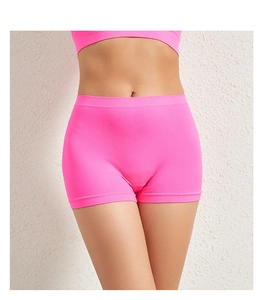 Detail of hot pink high waist seamless safety shorts with elastic ribbed texture