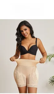 Detail of high waist lace shapewear in beige showing firm tummy control and hip lift