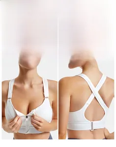 Detailed view of the white sports bra featuring a front zipper and cross-back straps