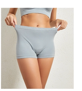 Close-up of grey high-waisted seamless safety shorts showing high elastic waistband stretch