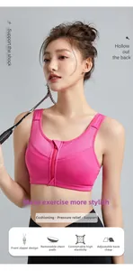 Detailed view of the front zipper closure and breathable mesh on this rose pink sports bra