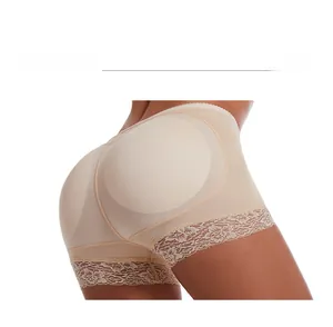 Gros plan sur la gaine amincissante taille haute avec bordure dentelle et coussinets