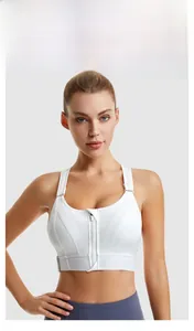 Close-up of white front-zip sports bra with adjustable straps and breathable mesh texture
