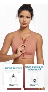 Detailed view of the auto-lock front zipper on a high-impact pink sports bra