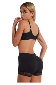 Vue latérale d'une gaine remonte-fesses noire avec dentelle montrant l'effet galbant