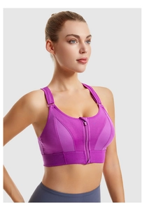 Detailed view of the purple sports bra with front zipper and breathable mesh fabric