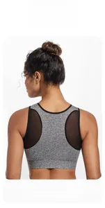 Racerback sports bra detail featuring breathable mesh panels and grey melange fabric
