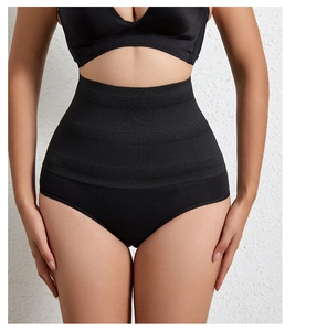 Detail of high waisted slimming underwear with ribbed tummy control panel in black