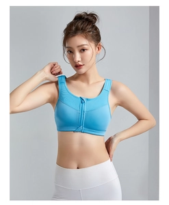 Sky blue zip-front sports bra featuring breathable mesh fabric and wide shoulder straps
