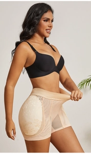 Detail of high-waist body shaper with floral lace and breathable mesh fabric in beige