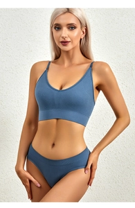 Detail of blue ribbed wireless lingerie set featuring a V-neck bralette and matching panties