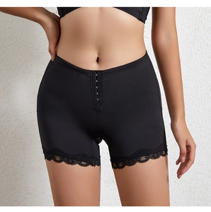 Close-up of black high-waisted shapewear with front metal hooks and delicate lace trim