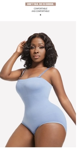 Detail view of seamless light blue bodysuit with high-stretch ribbed texture and thin straps