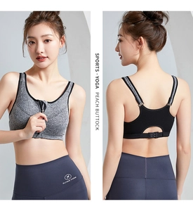 Close-up of women's sports bra with front zipper and hollow-out racerback detail
