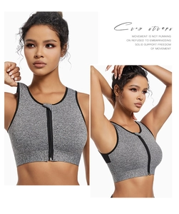 Front zipper high impact heather grey sports bra with cross straps and black trim detail