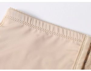 Detail of high-waist butt lifter with wave lace trim and adjustable hook-and-eye closure