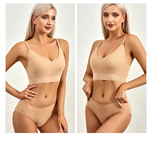 Detail of beige seamless lingerie set with fine vertical stripes and V-neckline design