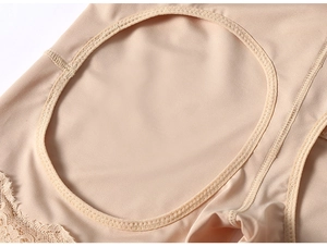 Detail of high-waisted shaping briefs showing lace trim and breathable hollow-out mesh fabric