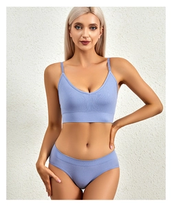 Detail of lavender rib-knit bralette and panty set showing the V-neck seamless texture