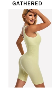 Detail view of light green ribbed knit compression bodysuit with wide shoulder straps