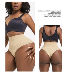Detail view of beige high waist tummy control thong with honeycomb texture for body shaping