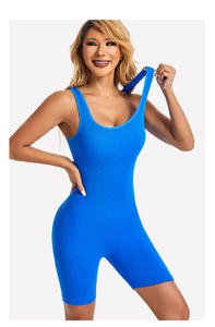 Detailed shot of cobalt blue ribbed fabric jumpsuit with sleeveless crew neck design