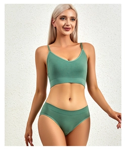Detailed view of seamless ribbed sage green lingerie set featuring thin shoulder straps