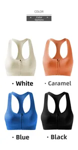 Dettaglio di quattro reggiseni sportivi a coste con zip in bianco, arancione, blu e nero