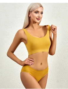 Close-up of bright yellow seamless ribbed knit lingerie set with U-neck bra and briefs