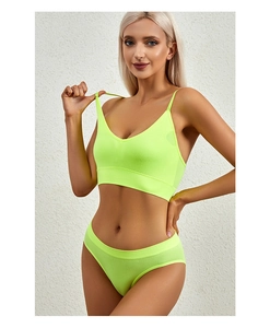 Detail of neon green seamless rib-knit lingerie set with V-neck bra and matching briefs