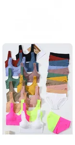 Flat lay of seamless ribbed lingerie sets in various vibrant colors on white background