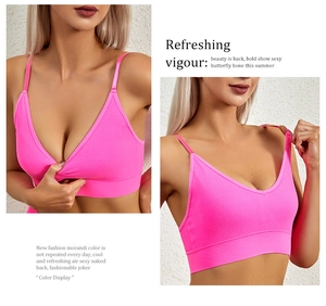 Detail of hot pink ribbed knit bralette showing deep V-neckline and textured fabric