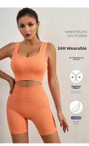 Detail of ribbed orange sports bra and shorts with 3D pads and seamless naked feeling