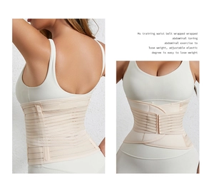 Detail of adjustable waist trainer belt with elastic straps and Velcro closure