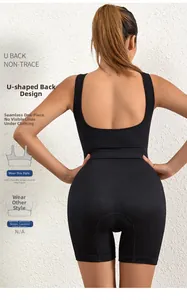 Detail of a seamless black bodysuit showing the deep U-back design and ribbed texture