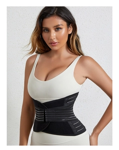 Detail view of adjustable black waist trainer with elastic compression straps for support