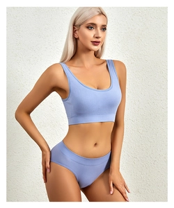 Detail view of seamless ribbed wireless bra and panty set in violet lavender fabric