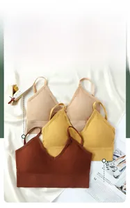Detail of ribbed V-neck bras with thin straps and elastic hem in multiple colors