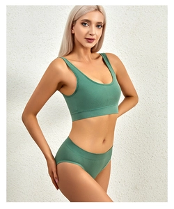 Detail of sage green ribbed seamless lingerie set with bralette and matching panty
