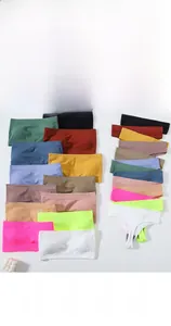 Flat lay of ribbed seamless tube top and thong sets in multiple vibrant colors