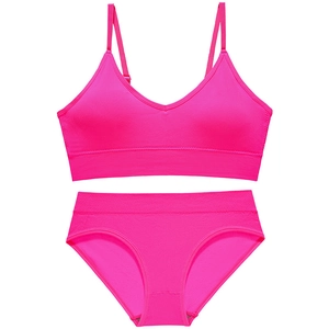 Fluorescent pink ribbed wireless bra and panty set with adjustable thin straps