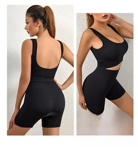 Close-up of black ribbed two-piece sports set featuring U-back bra and high-waist shorts