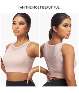 Detail of pink seamless sports bra featuring breathable hollow-out mesh and racerback design