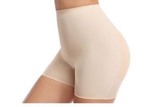 Detailed back view of high-waisted seamless shapewear with peach lift design in beige