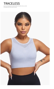 Detail of light purple seamless sports bra featuring V-shaped mesh for breathability