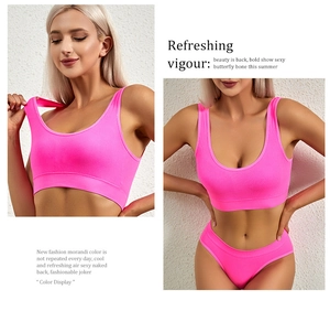 Detailed view of hot pink ribbed seamless sports bra and panties set for women